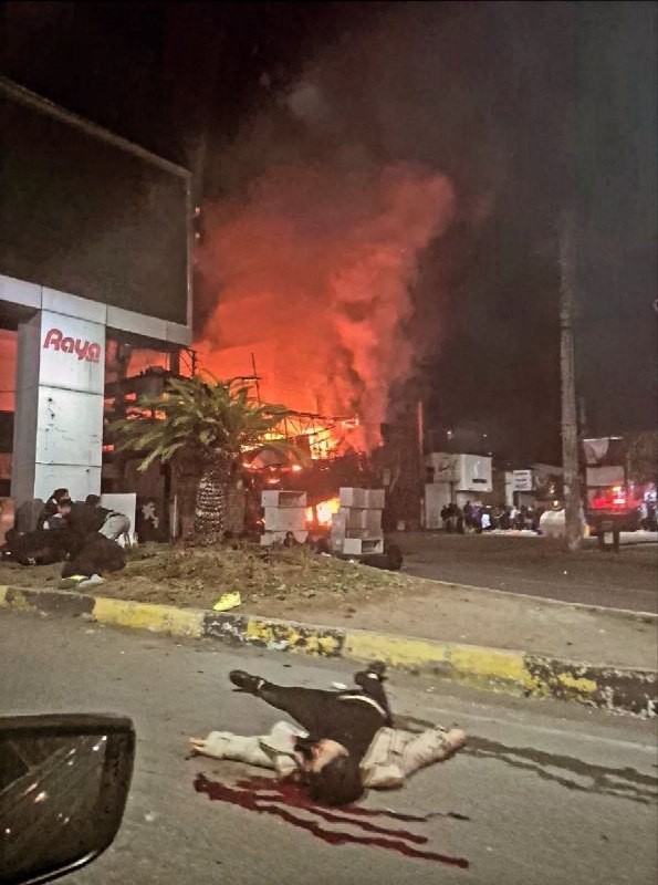 一名勇敢的女性头部中枪，倒在街头